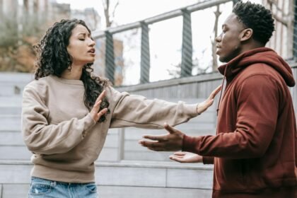 Multiracial couple having conflict on street