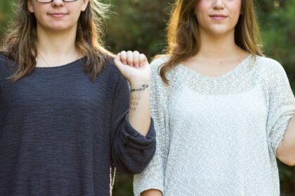 woman showing her wrist with tattoo