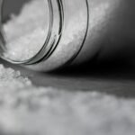 Selective Focus Photo of Salt in Glass Jar