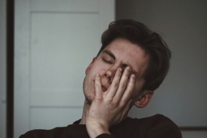 man wearing black crew-neck top